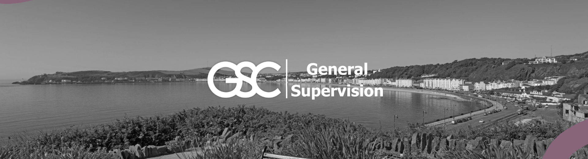 Peel Castle and Corrin's Hill at dusk shown from the sea